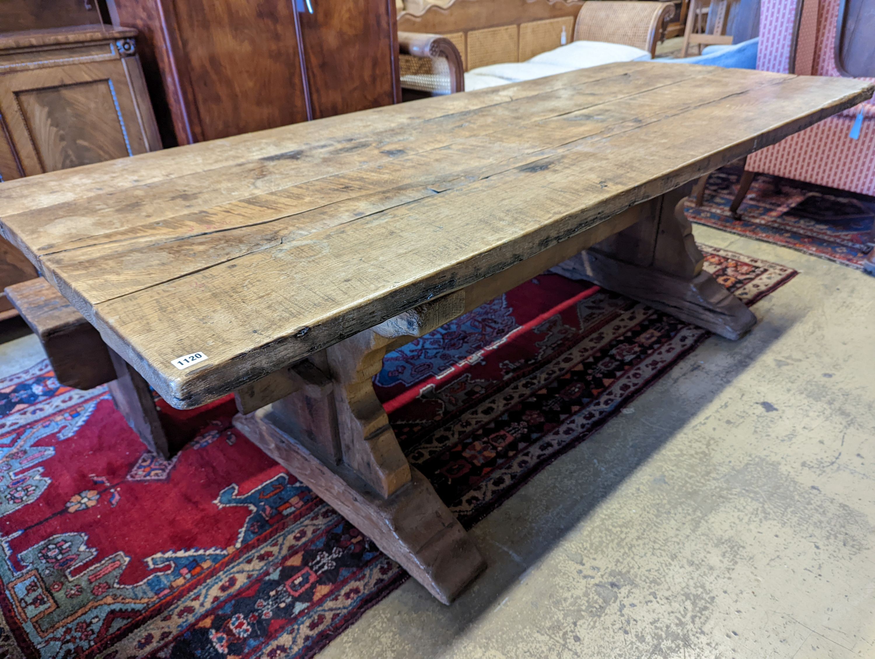 An 18th century style oak refectory dining table with planked top, length 228cm, depth 96cm, height 74cm